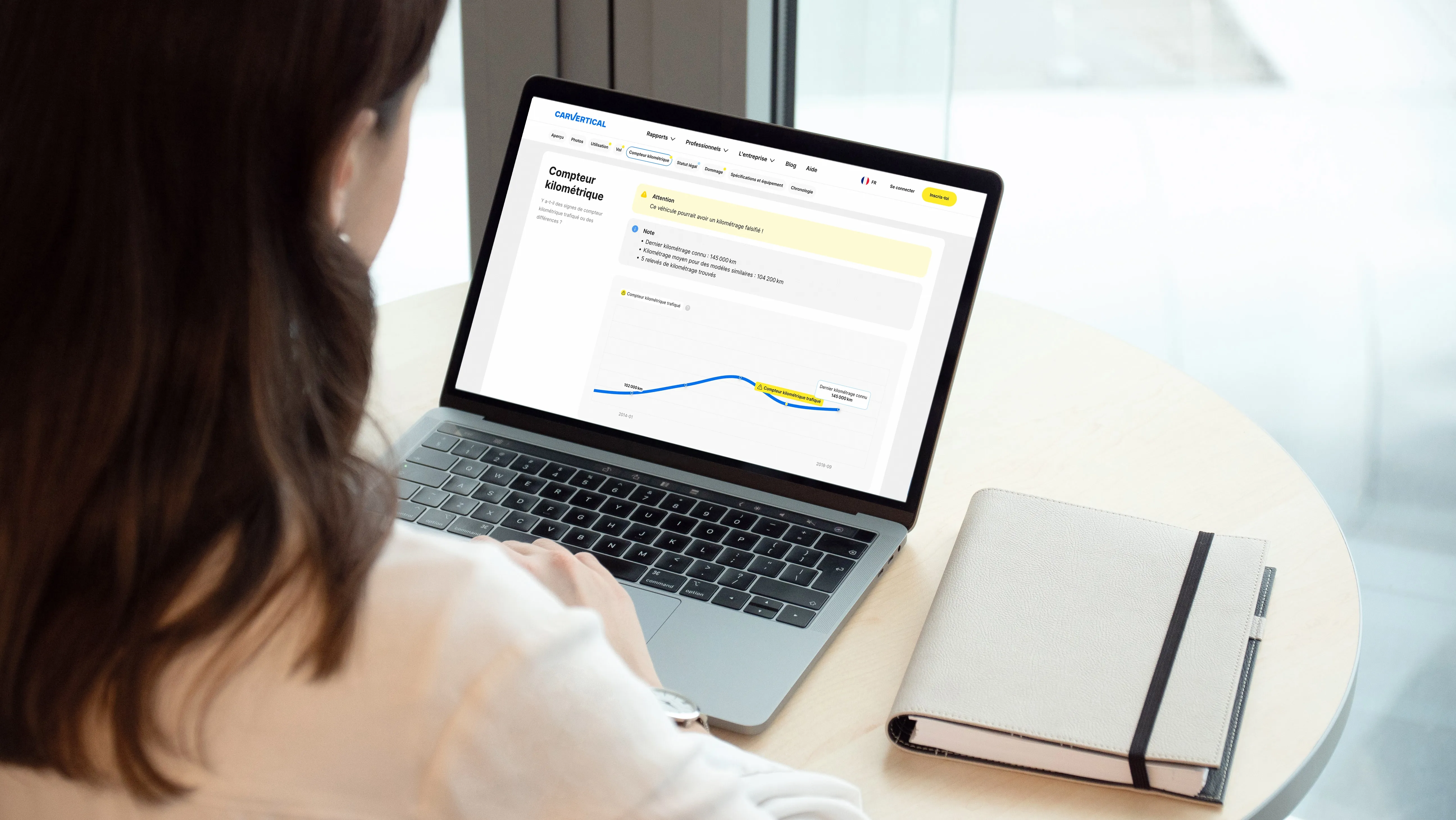 Rapport carVertical affichant un compteur kilométrique trafiqué détecté grâce au numéro VIN